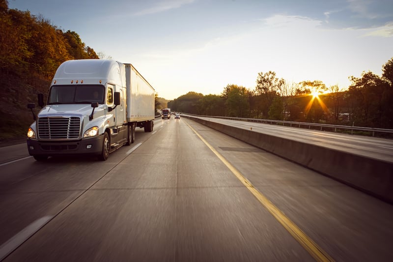 White truck traveling to destination