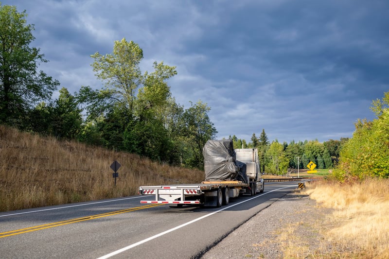 Flatbed truck in motion