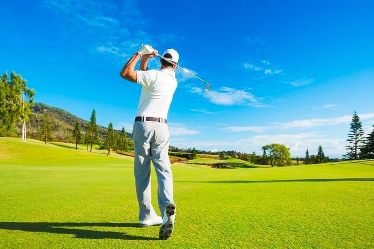 Golfer taking a shot on the course