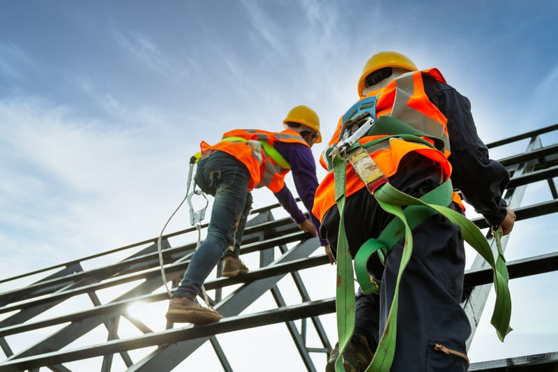 Construction workers on a roof