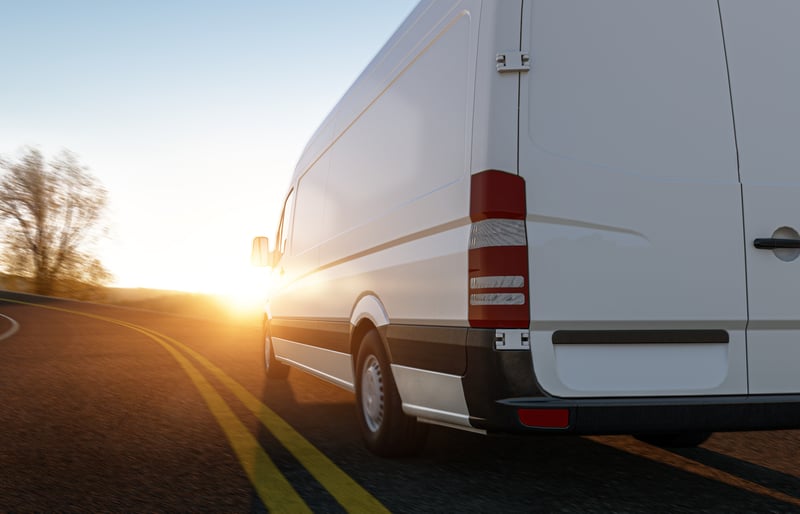 Sprinter van driving on the road