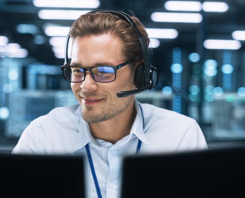 Concentrated Male Customer Support Agent