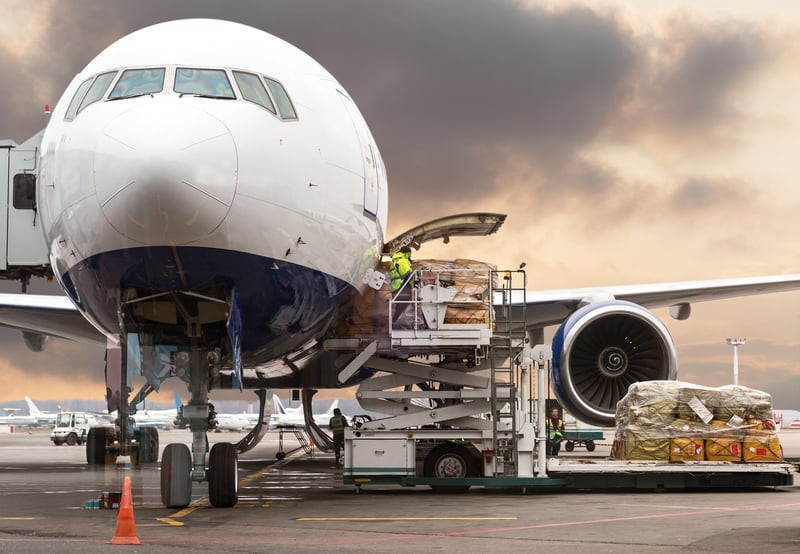 Loading cargo on airplane