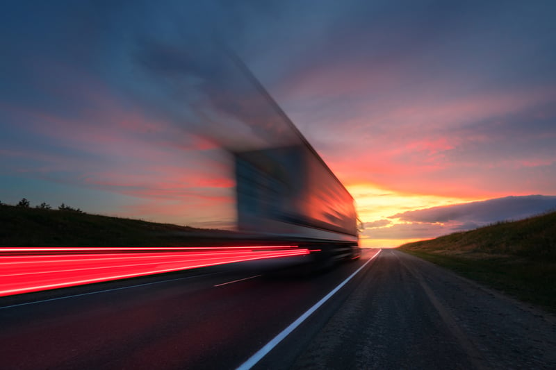 Truck on highway motion blur