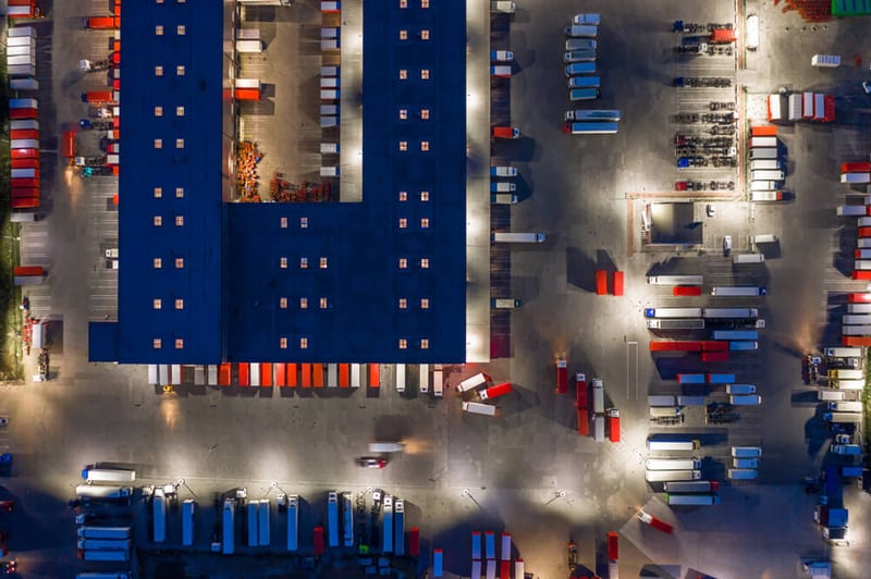 aerial view of trucking warehouse at night