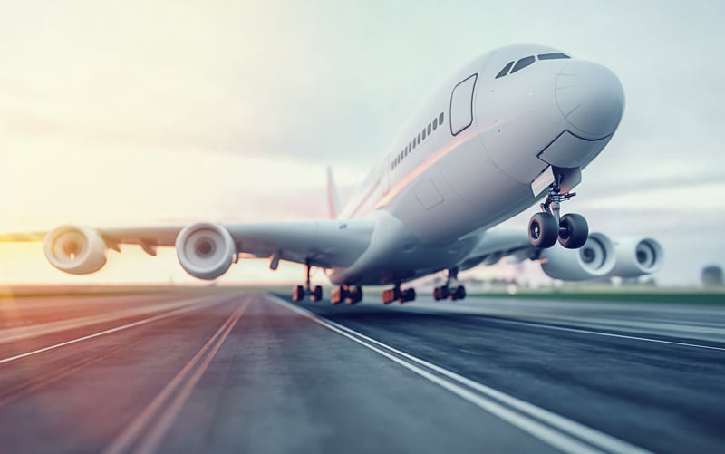 airplane taking off on runway