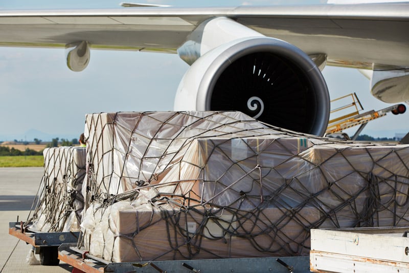 cargo waiting to be loaded onto airplane